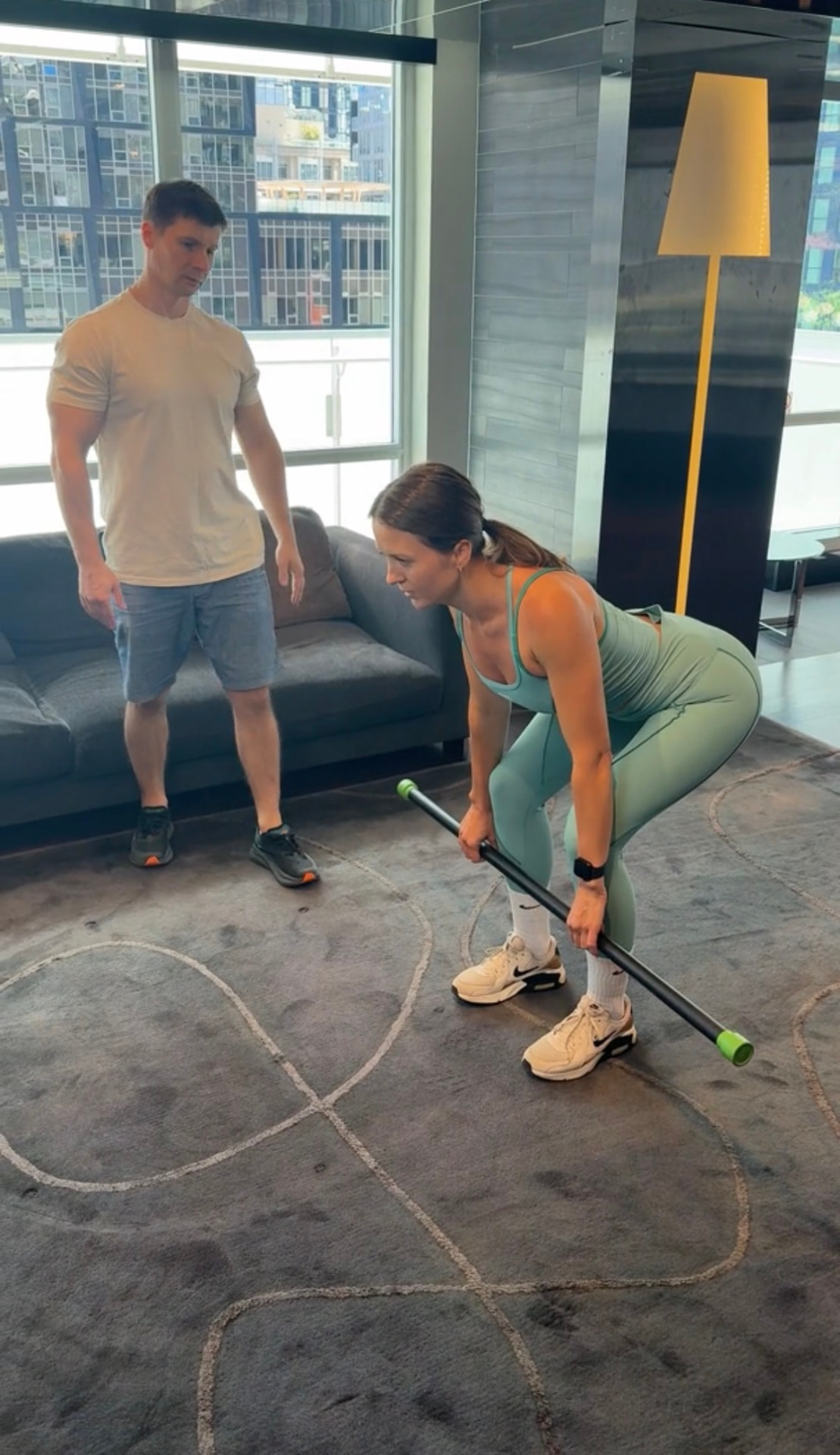 DeltaFit trainer and client working together mid-session